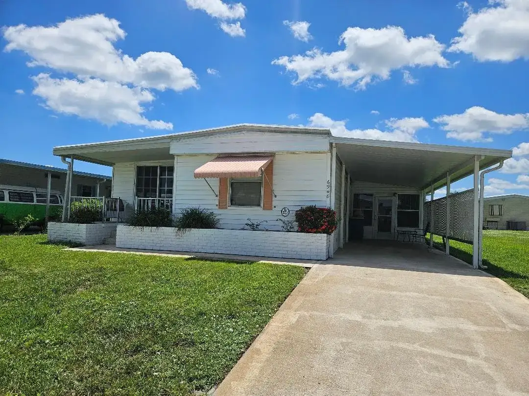 6948 SE DELEGATE Street, Hobe Sound FL 33455 photo 2