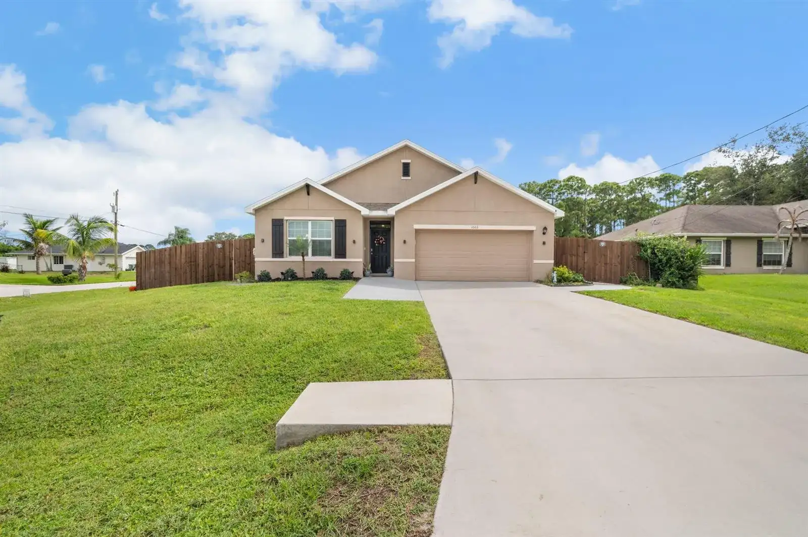 1602 SW Lofgren Avenue, Port St. Lucie FL 34953 photo 2