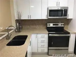 2 bedroom 2 bath Residential for sale at 10457 NW 8th St # 105, Pembroke Pines FL 33026