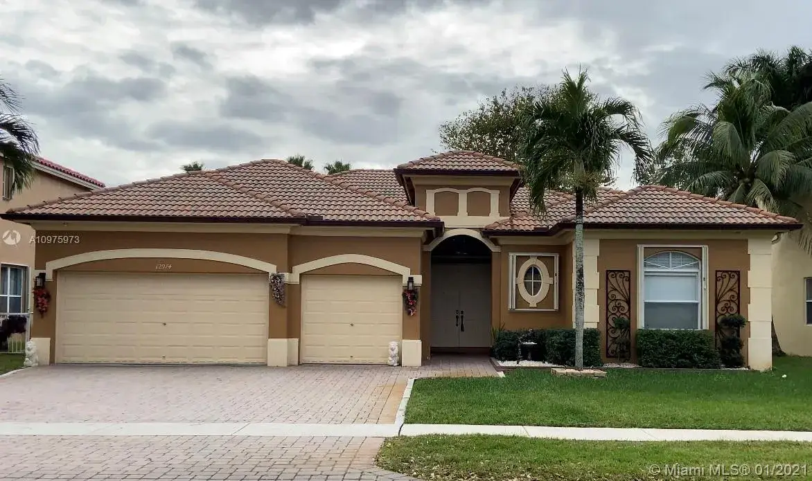 5 bedroom 2 bath Residential for sale at 12974 SW 24th St, Miramar FL 33027