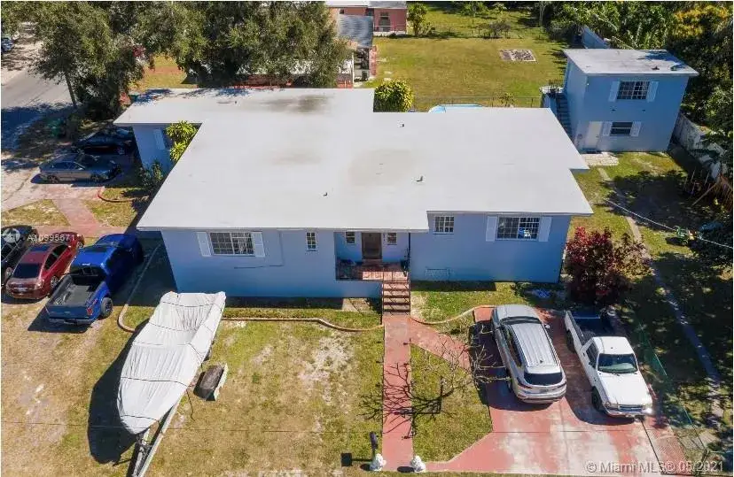 Residential Income for sale at 1400 NE 148th St, Miami FL 33161