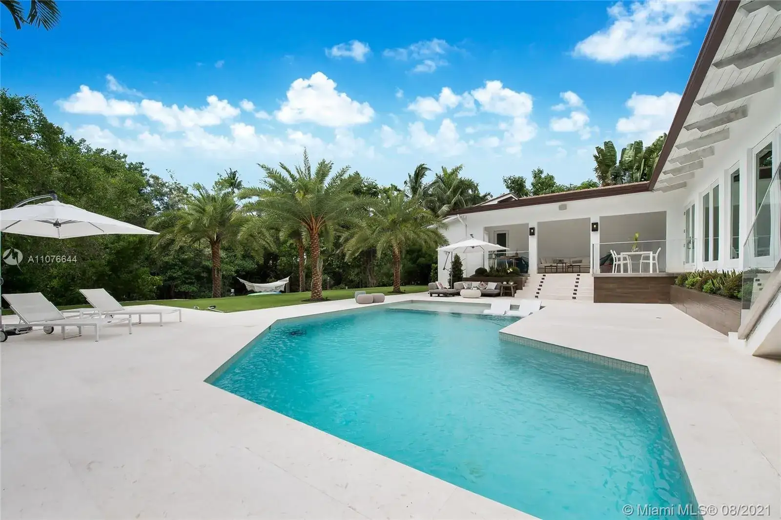 5 bedroom 6 bath Residential for sale at 7233 Los Pinos Blvd, Coral Gables FL 33143