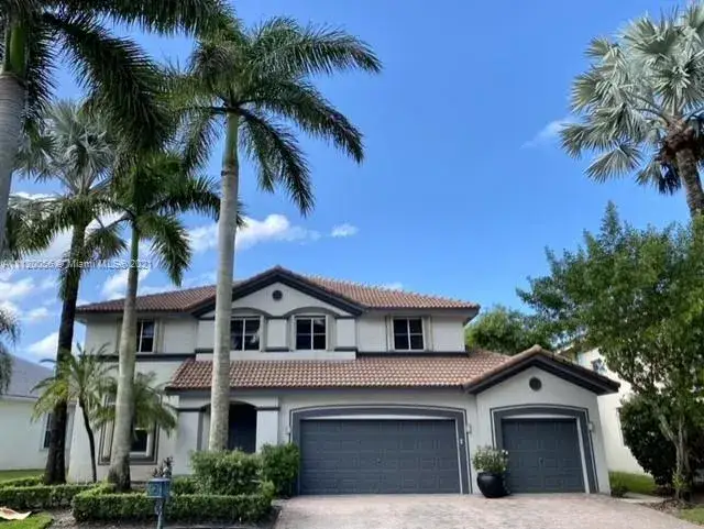 6 bedroom 5 bath Residential for sale at 2132 Quail Roost Dr, Weston FL 33327
