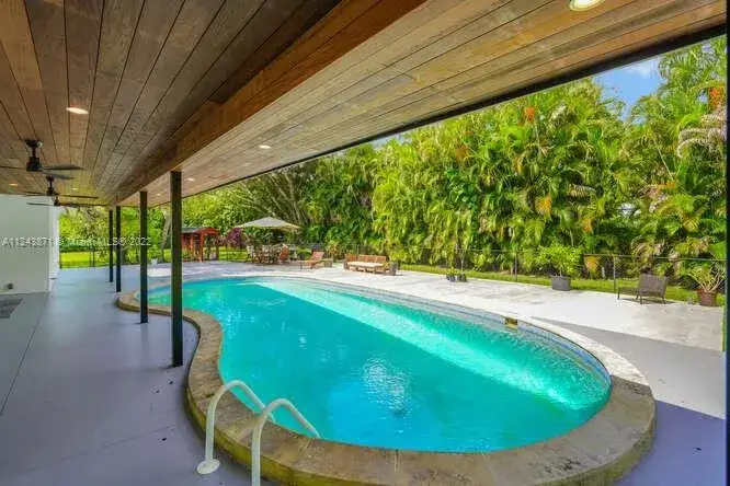 6 bedroom 7 bath Residential for sale at 12100 SW 69th Ct, Pinecrest FL 33156