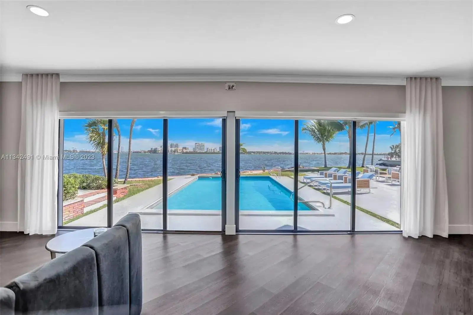 6 bedroom 5 bath Residential Lease for rent at 9101 N Bayshore Dr, Miami FL 33138