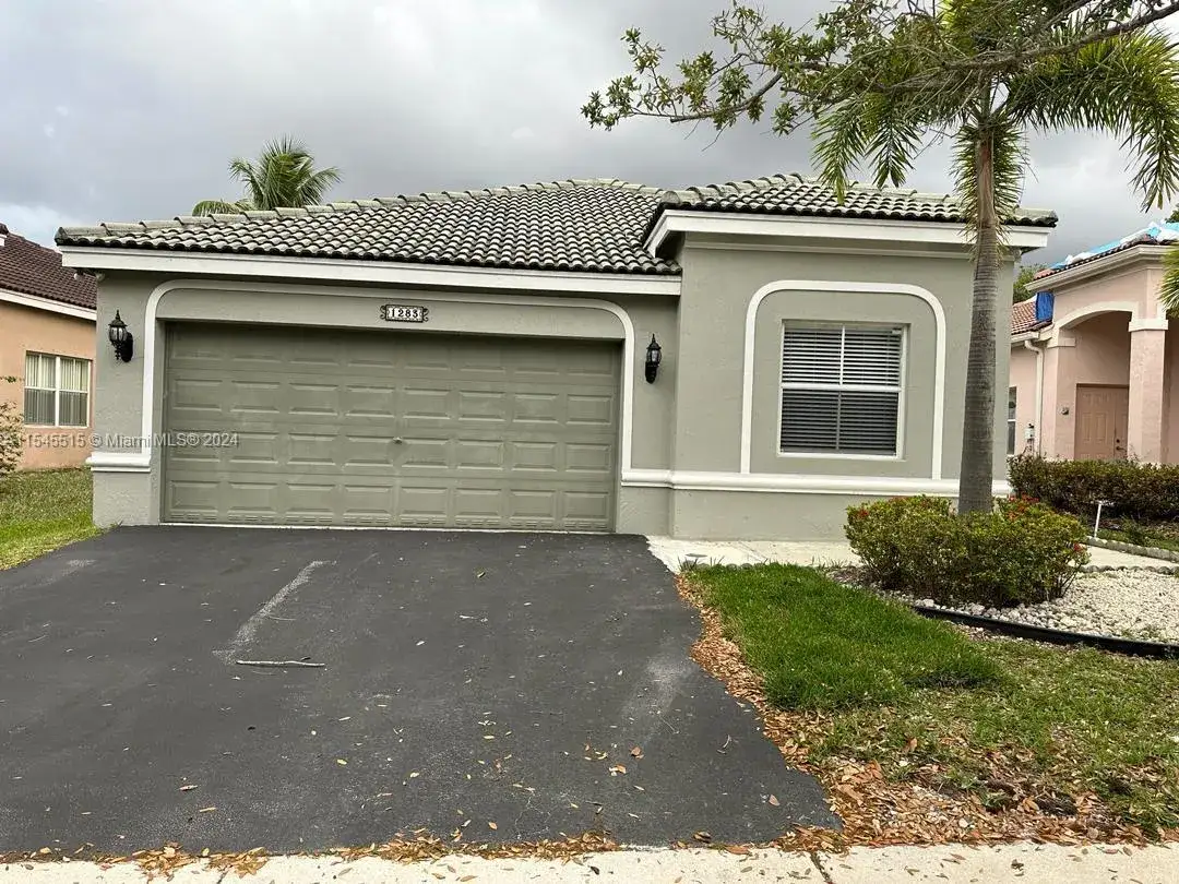 4 bedroom 2 bath Residential for sale at 1283 Chinaberry Dr, Weston FL 33327