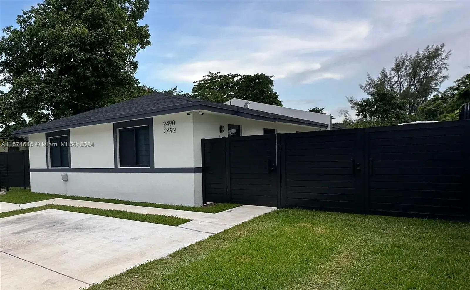 4 bedroom 4 bath Residential Lease for rent at 2490 NW 44th St # 2490, Miami FL 33142