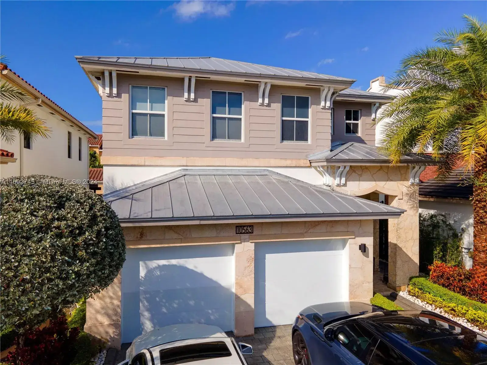 4 bedroom 4 bath Residential for sale at 10563 NW 70th Ln, Doral FL 33178