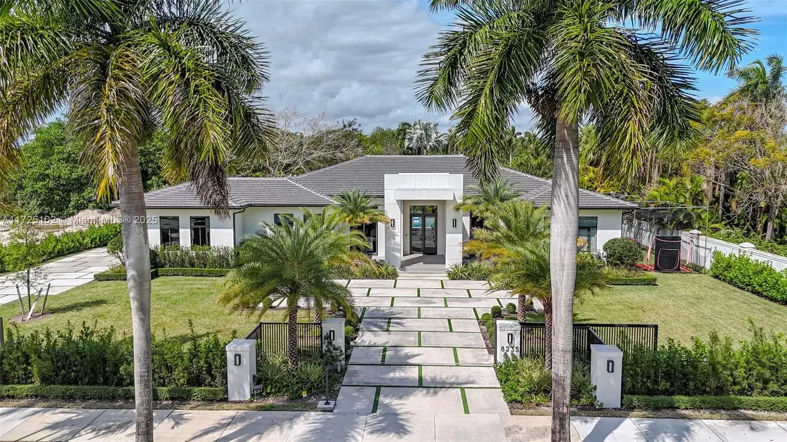 5 bedroom 5 bath Residential for sale at 8235 SW 184 Street, Palmetto Bay FL 33157