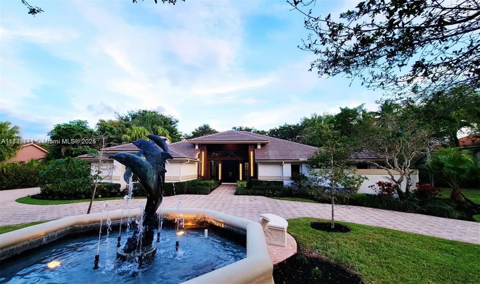 6 bedroom 7 bath Residential for sale at 7700 S Woodridge Dr, Parkland FL 33067