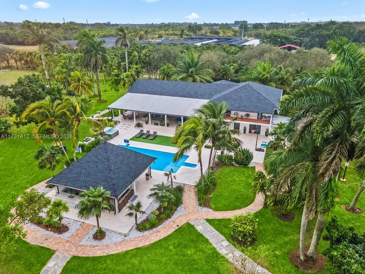 5 bedroom 6 bath Residential for sale at 14875 SW 212th St, Miami FL 33187