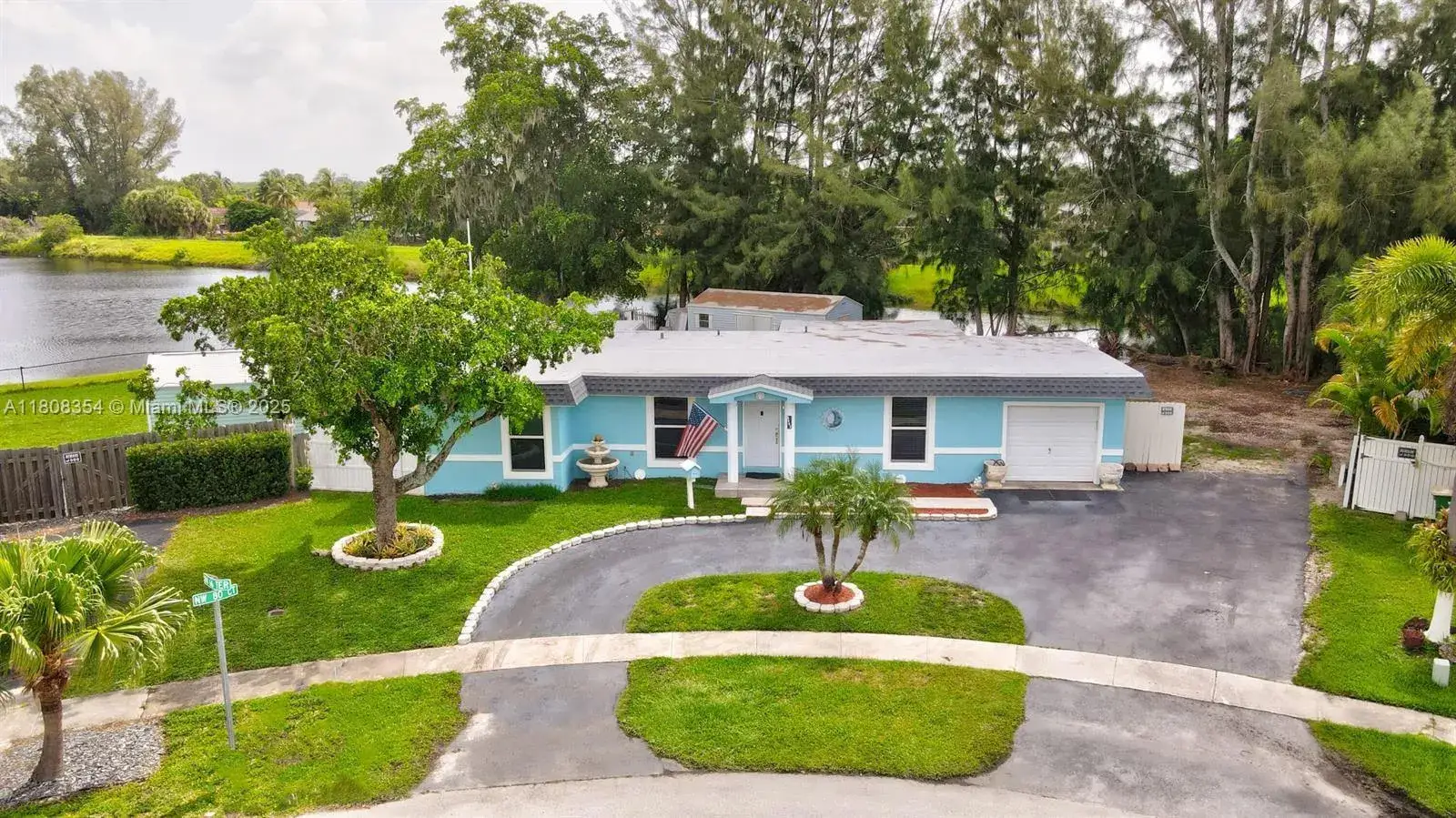 4 bedroom 2 bath Residential for sale at 6605 NW 80th Ct, Tamarac FL 33321