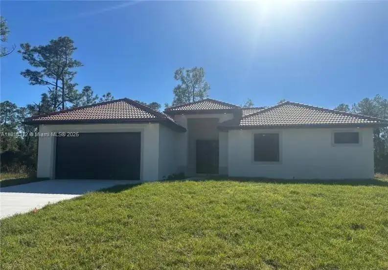 4 bedroom 2 bath Residential for sale at 2002 E 13th St, Lehigh Acres FL 33972