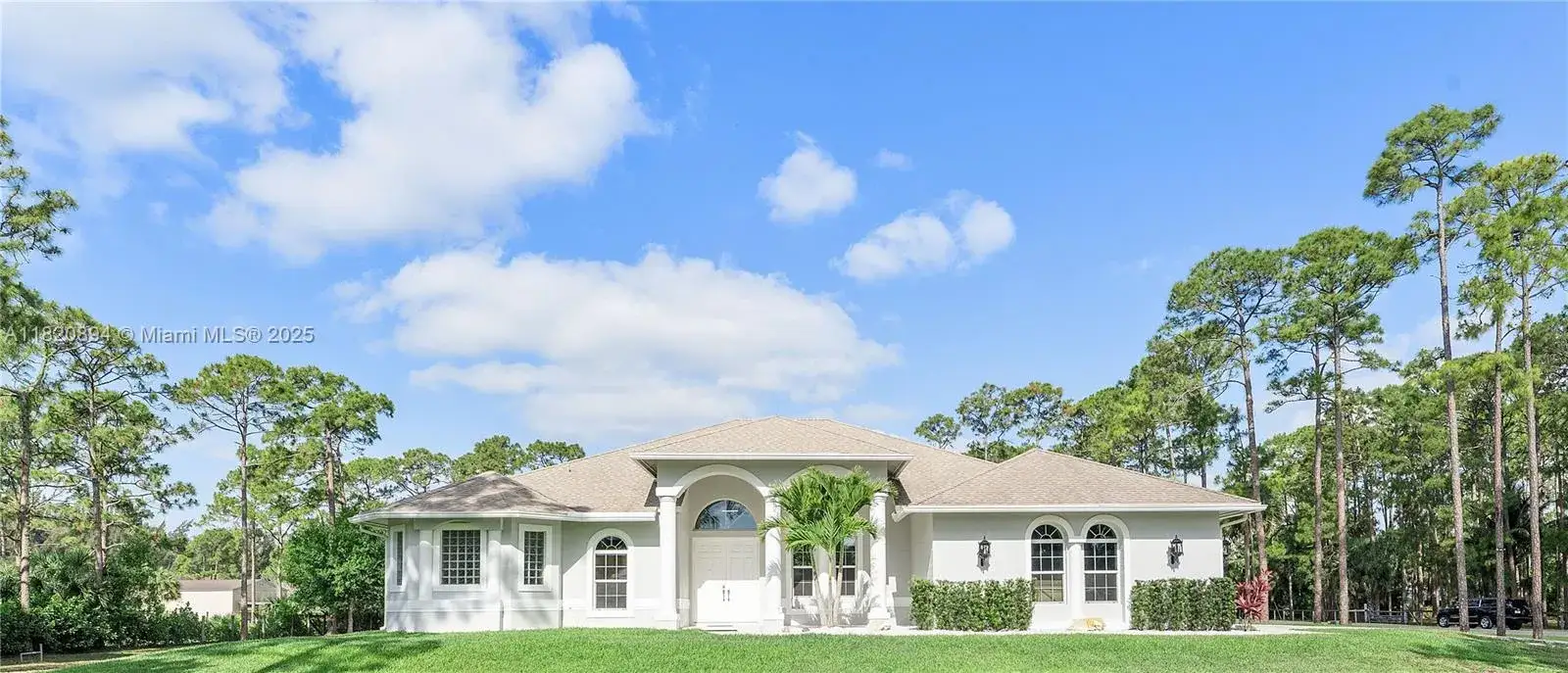 5 bedroom 4 bath Residential for sale at 17038 N 61st Pl N, Loxahatchee FL 33470