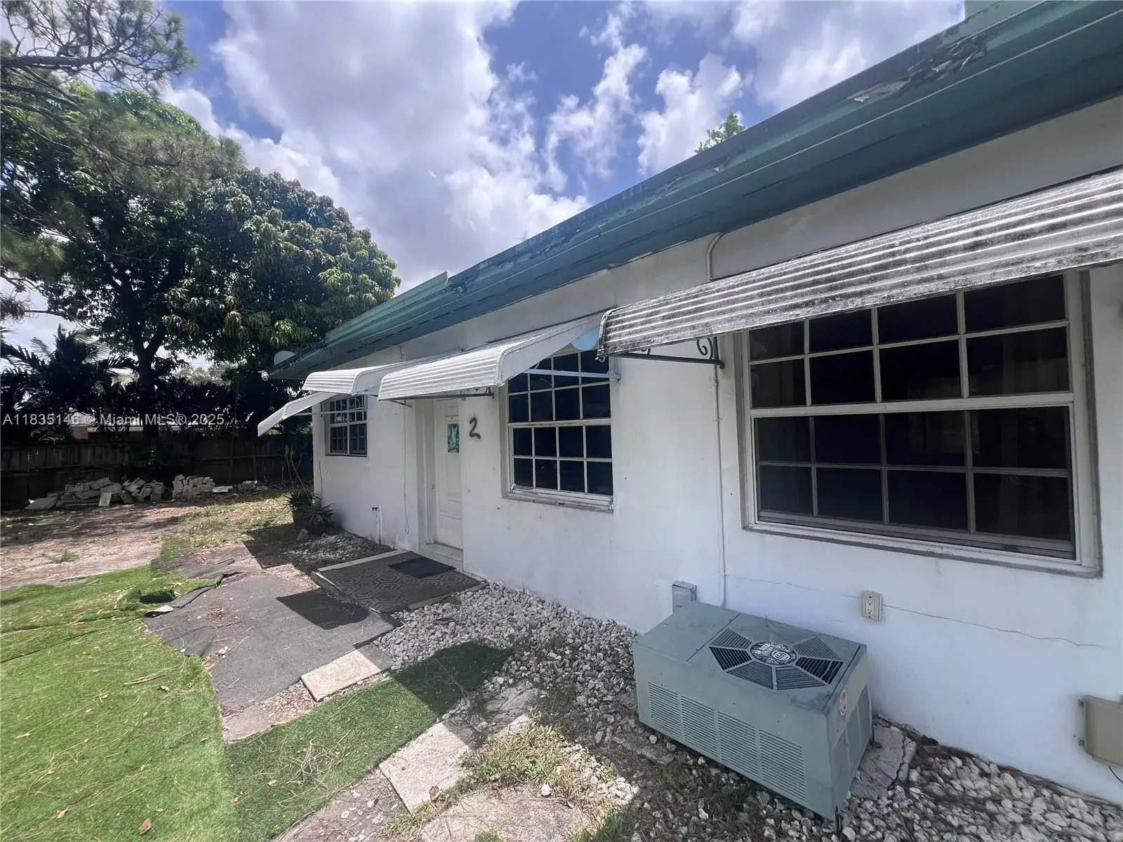Residential Income for sale at 2420 NW 99th Ter, Miami FL 33147