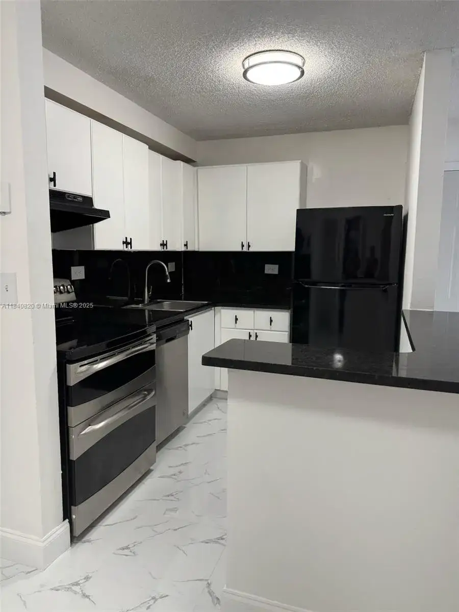 2 bedroom 1 bath Residential for sale at 7010 NW 179th St # 105, Hialeah FL 33015