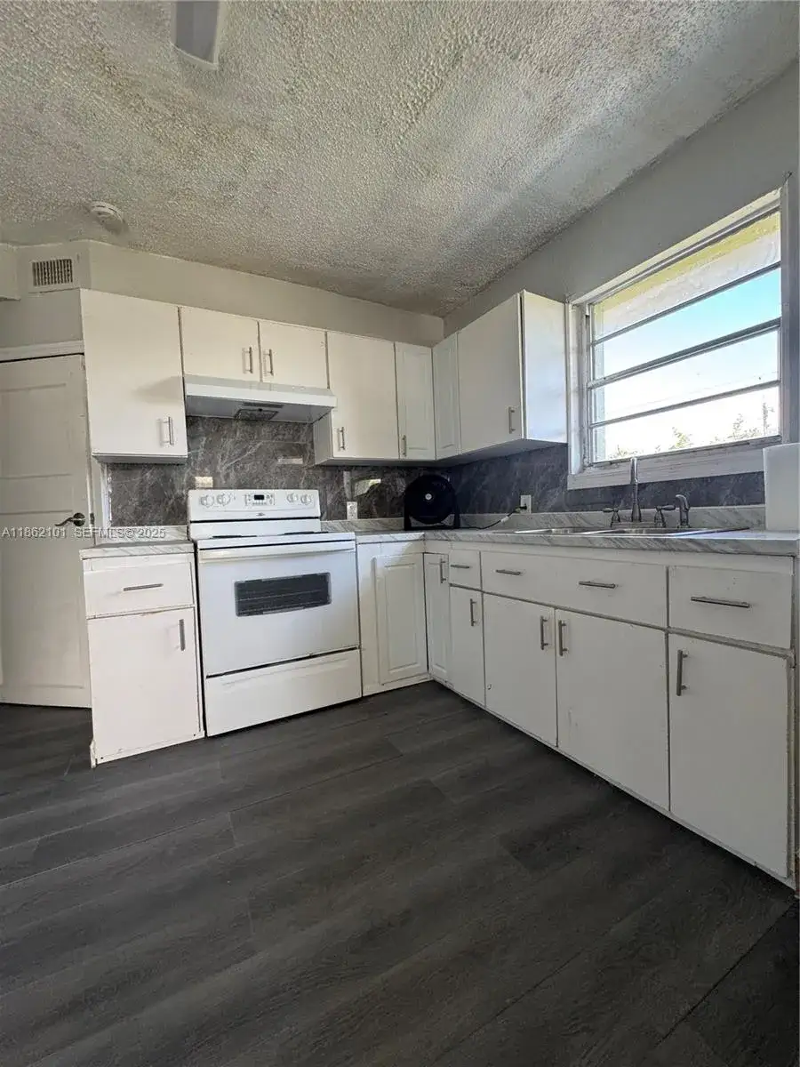 4 bedroom 2 bath Residential Lease for rent at 7802 NW 8th Ave # 1, Miami FL 33150