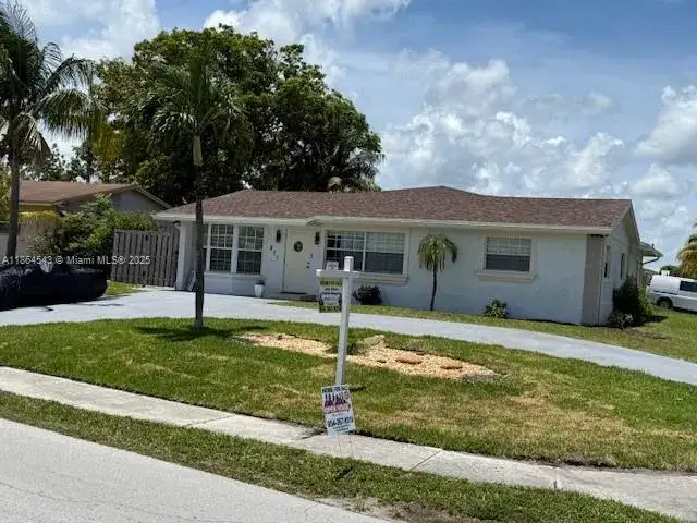4 bedroom 2 bath Residential for sale at 671 SW 14th St, Deerfield Beach FL 33441
