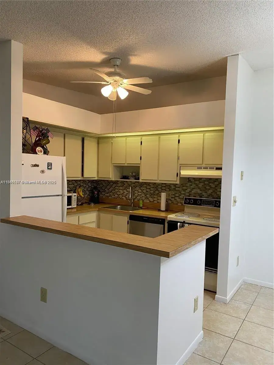 2 bedroom 1 bath Residential Lease for rent at 10407 E Clairmont Cir # 210, Tamarac FL 33321