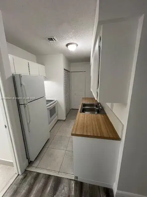 2 bedroom 2 bath Residential Lease for rent at 18336 NW 68th Ave # L, Hialeah FL 33015