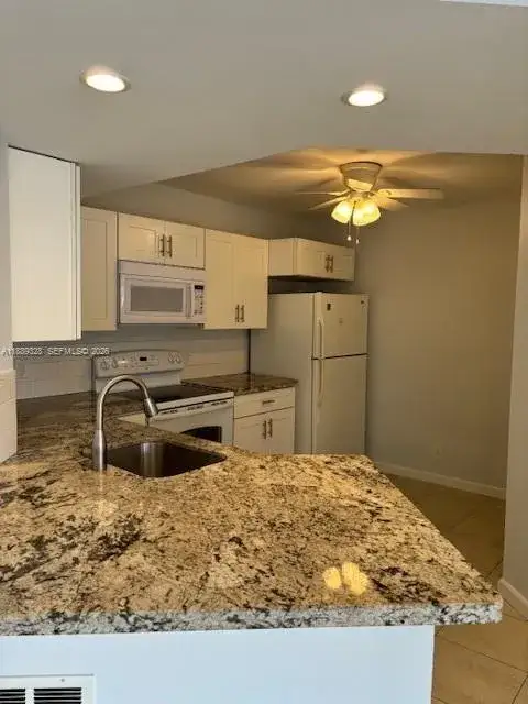 2 bedroom 2 bath Residential for sale at 8977 Wiles Rd # 103, Coral Springs FL 33067