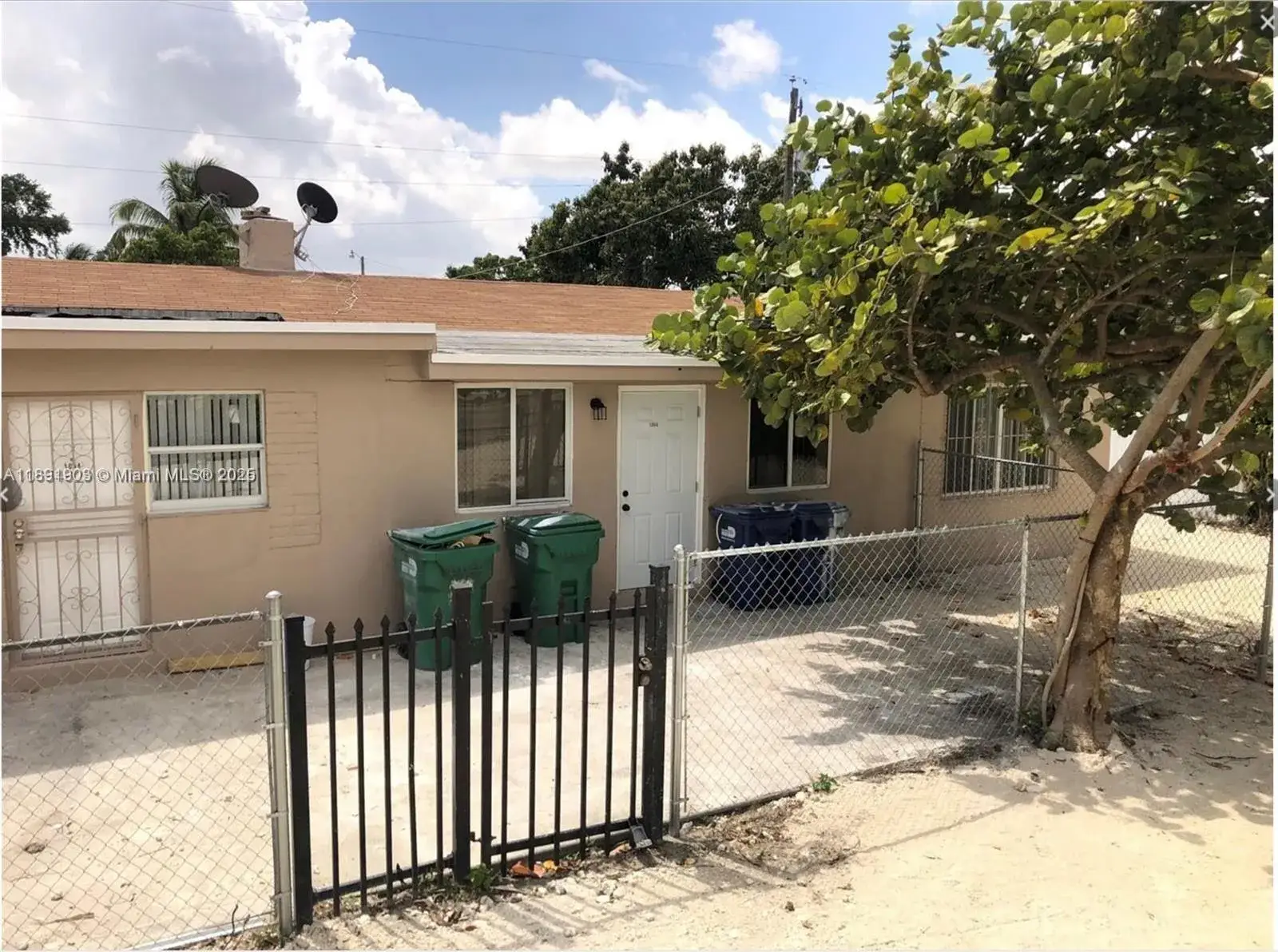 Residential Income for sale at 1064 NW 103rd St, Miami FL 33150