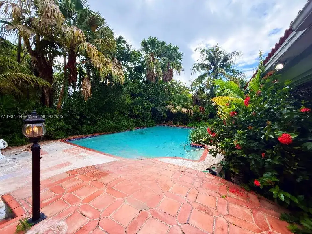 4 bedroom 3 bath Residential Lease for rent at 1915 Country Club Prado, Coral Gables FL 33134