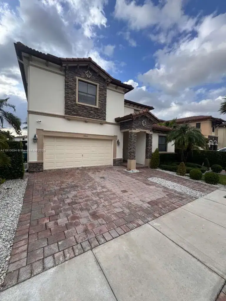 5 bedroom 4 bath Residential for sale at 8850 NW 98th Ct, Doral FL 33178