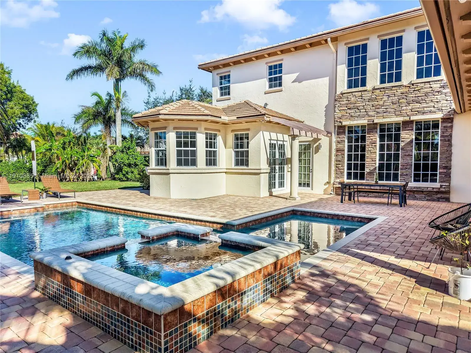 6 bedroom 5 bath Residential for sale at 12008 NW 69th Ct, Parkland FL 33076