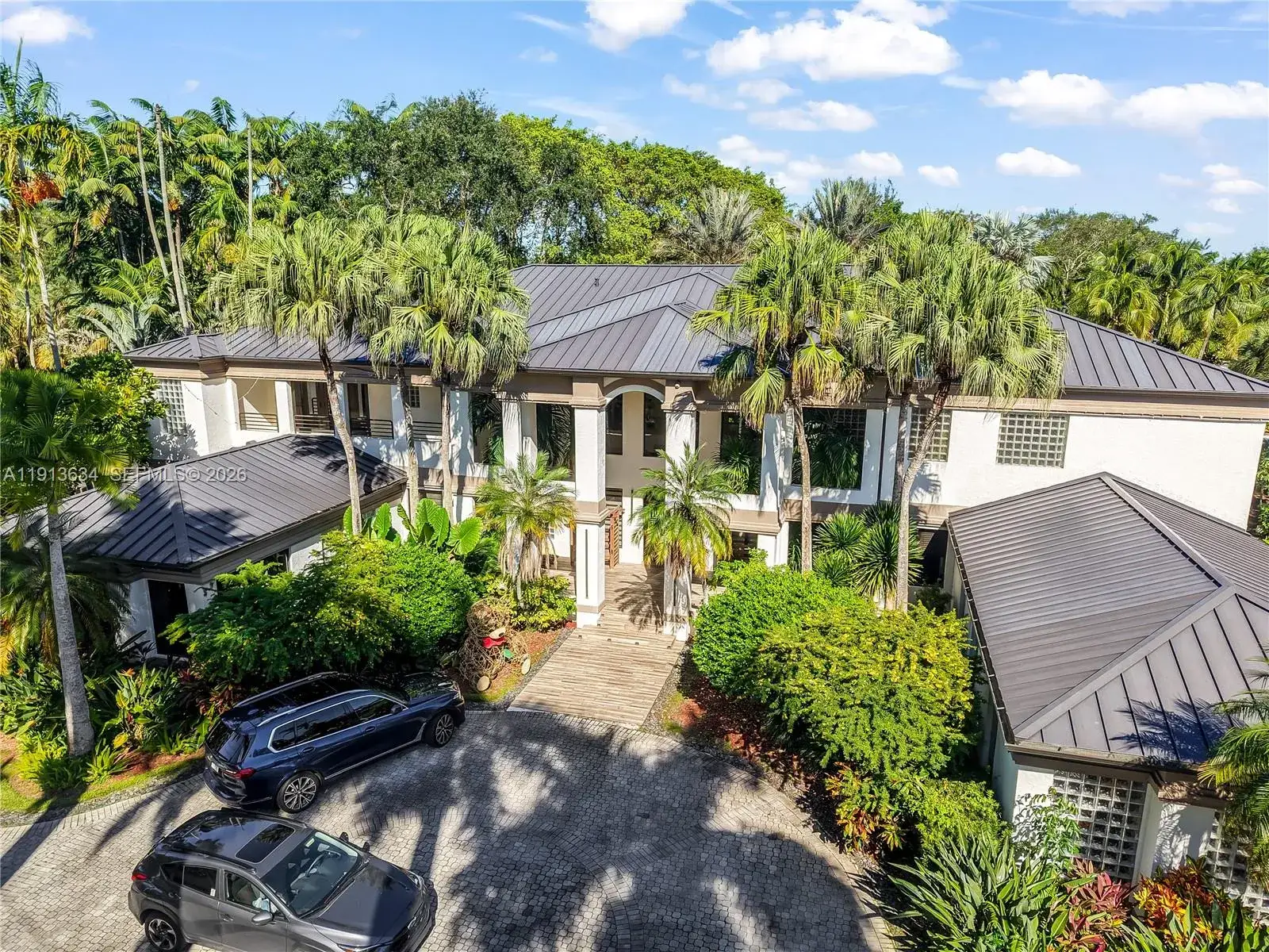 7 bedroom 5 bath Residential for sale at 10395 SW 67th Ave, Pinecrest FL 33156