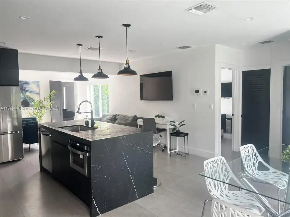 4 bedroom 3 bath Residential Lease for rent at 15 NW 52nd St, Miami FL 33127