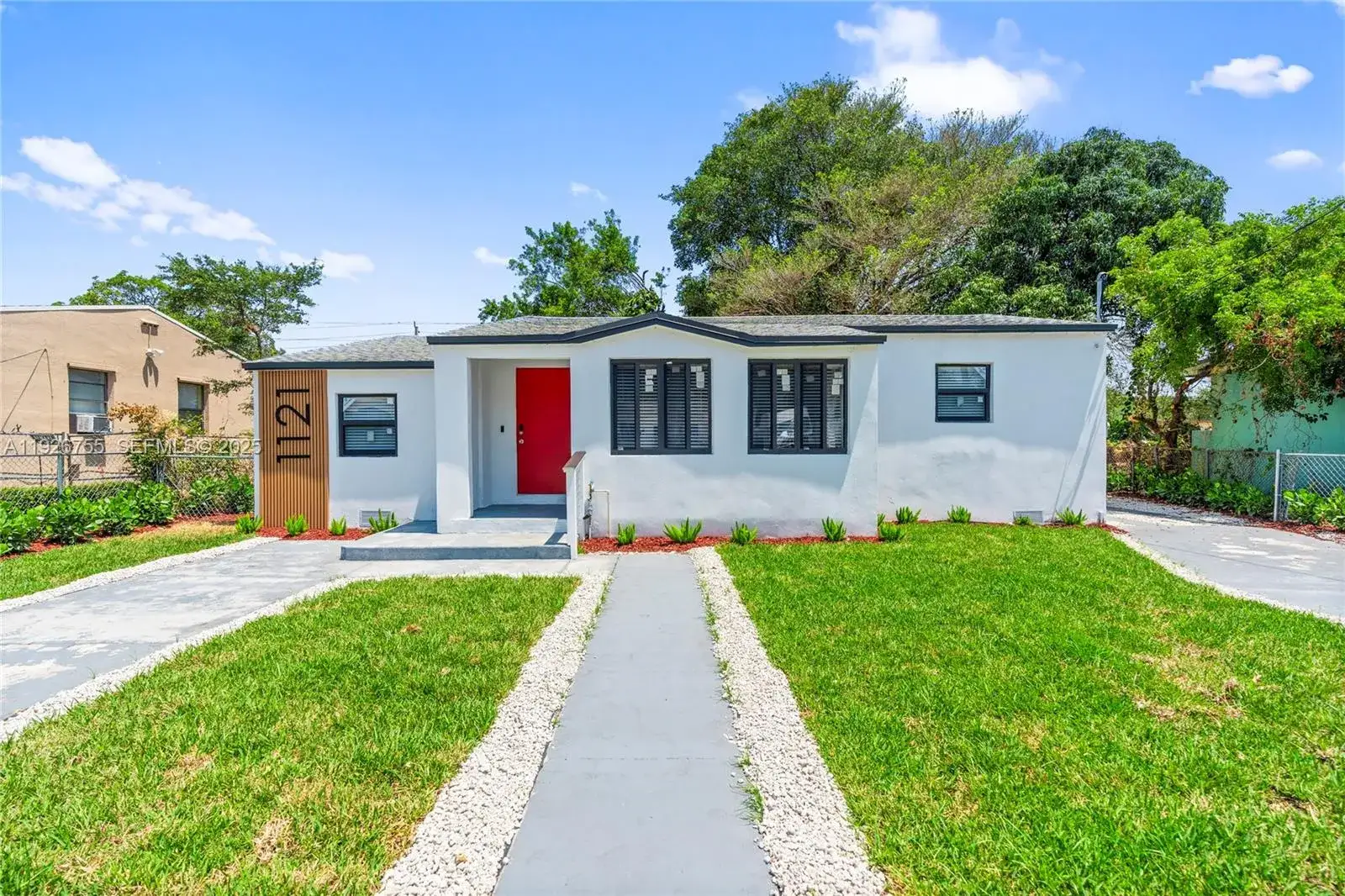 3 bedroom 2 bath Residential for sale at 1121 NW 57th St, Miami FL 33127