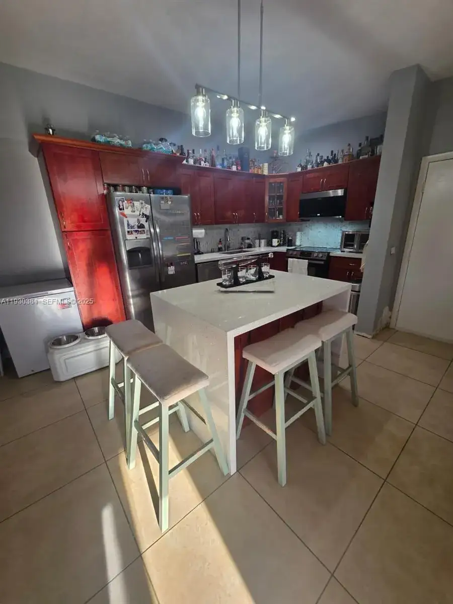 2 bedroom 2 bath Residential Lease for rent at 9727 Hammocks Blvd # 207D, Miami FL 33196