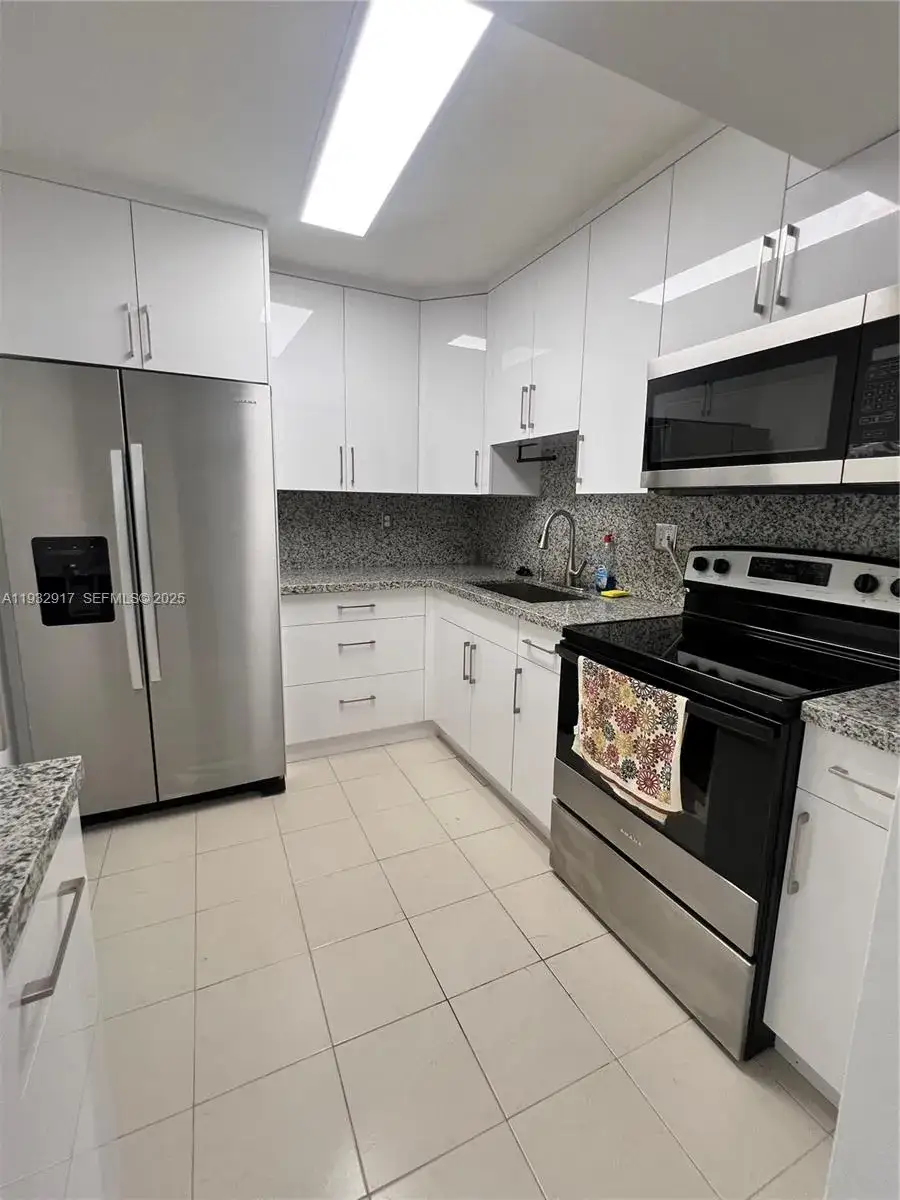 3 bedroom 2 bath Residential Lease for rent at 4717 NW 7th St # 10, Miami FL 33126