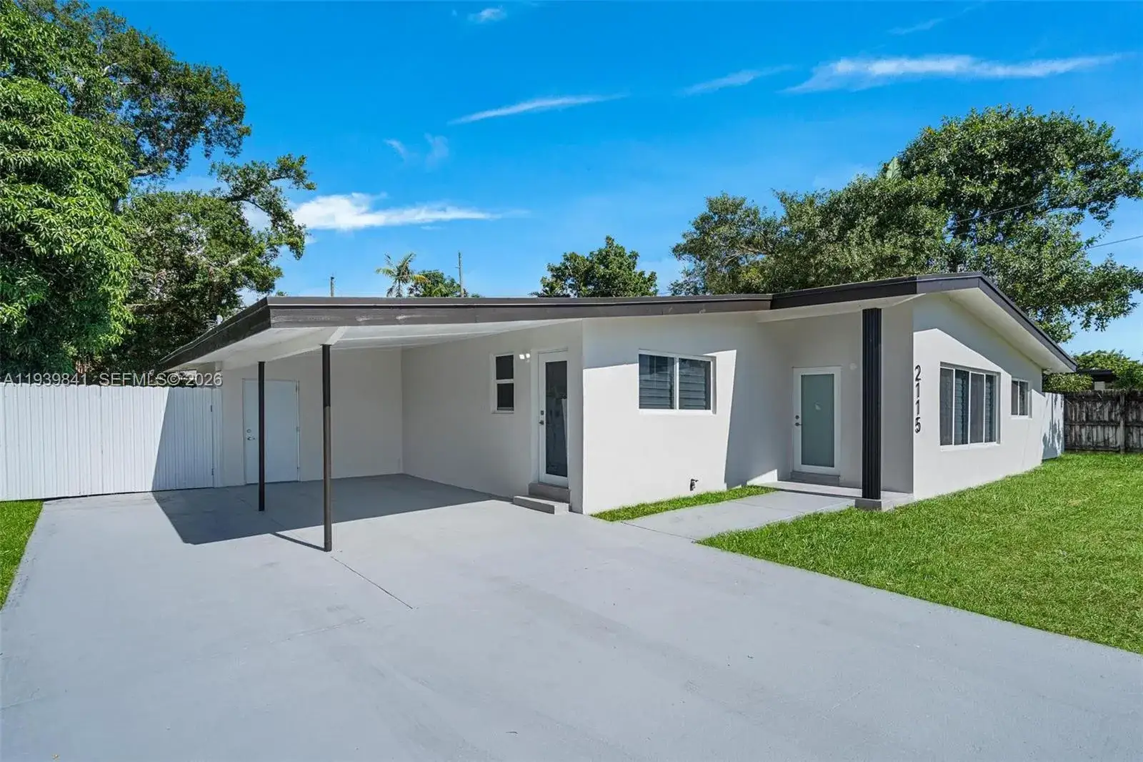 3 bedroom 2 bath Residential for sale at 2115 NW 129th St, Miami FL 33167