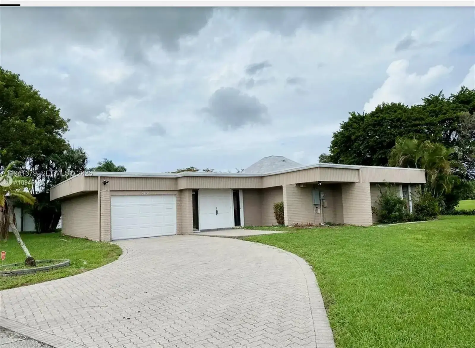 3 bedroom 2 bath Residential for sale at 6105 Royal Poinciana Ln, Tamarac FL 33319