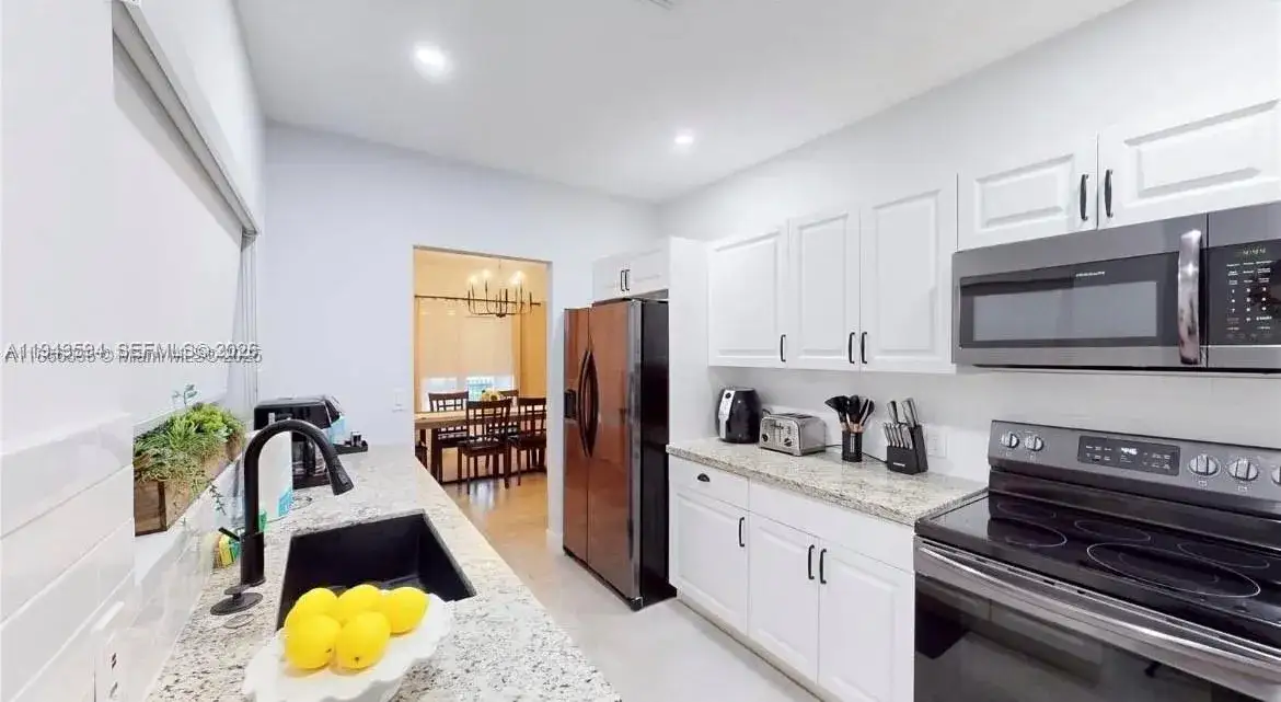 4 bedroom 3 bath Residential Lease for rent at 52 NW 47th Ter # 0, Miami FL 33127