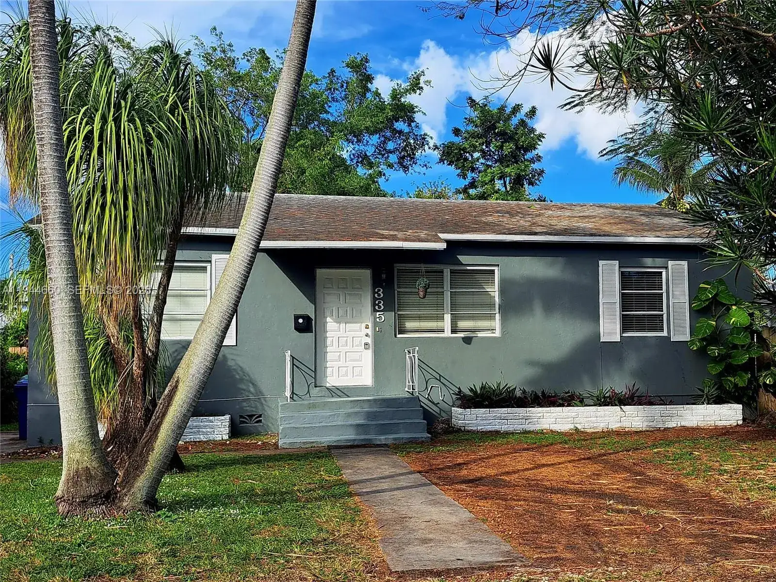 3 bedroom 2 bath Residential for sale at 335 NW 102nd St, Miami FL 33150