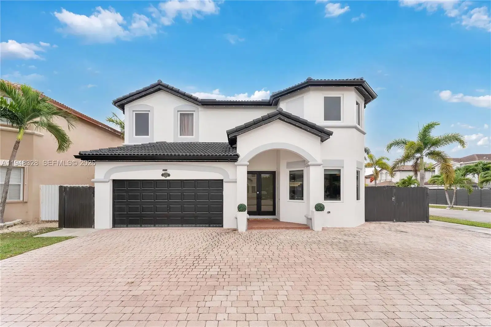 4 bedroom 4 bath Residential for sale at 14452 SW 10th St, Miami FL 33184
