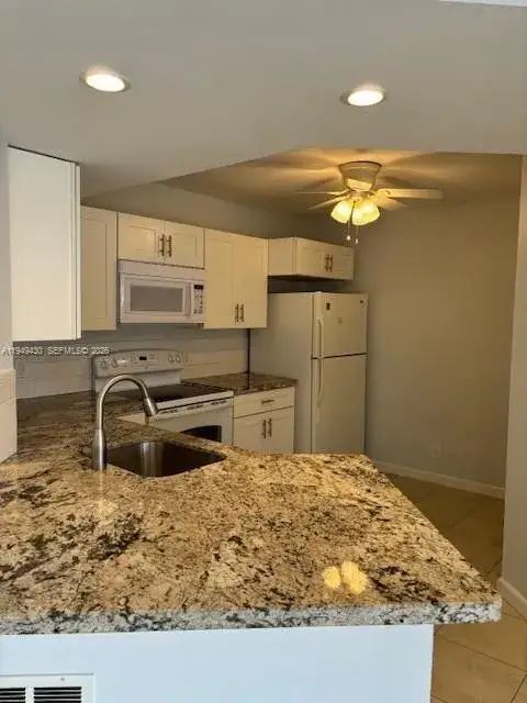 2 bedroom 2 bath Residential Lease for rent at 8701 Wiles Rd # 103, Coral Springs FL 33067