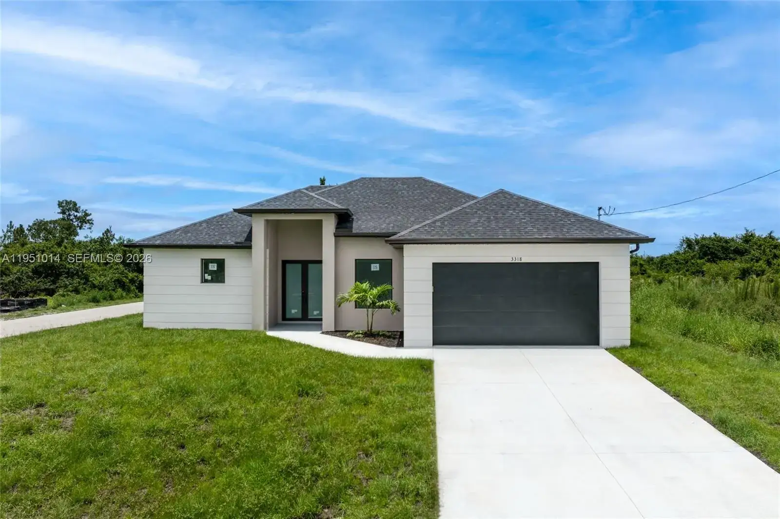 3 bedroom 2 bath Residential for sale at 3318 30th St SW, Lehigh Acres FL 33976