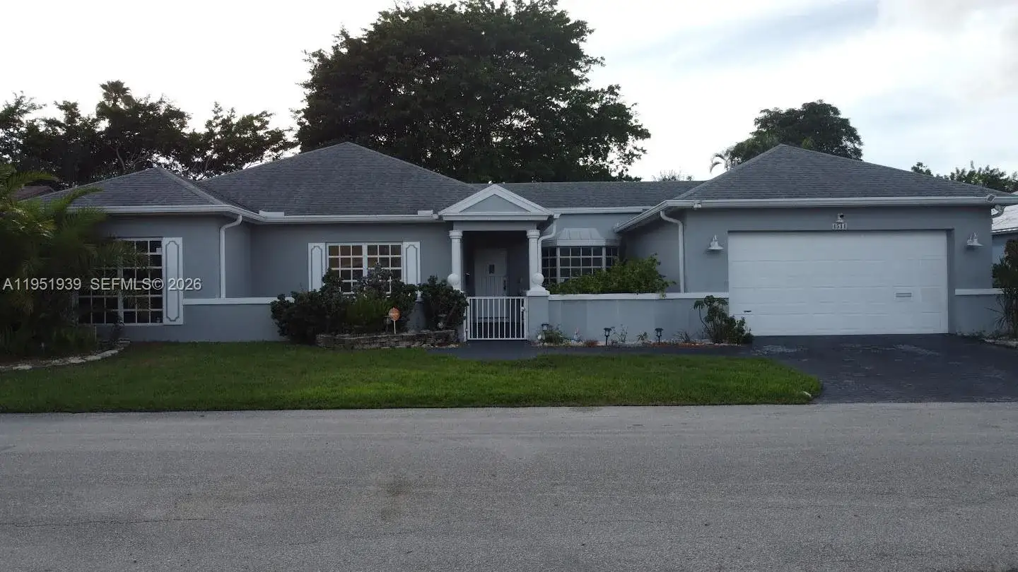 3 bedroom 2 bath Residential for sale at 4511 Queen Palm Ln, Tamarac FL 33319