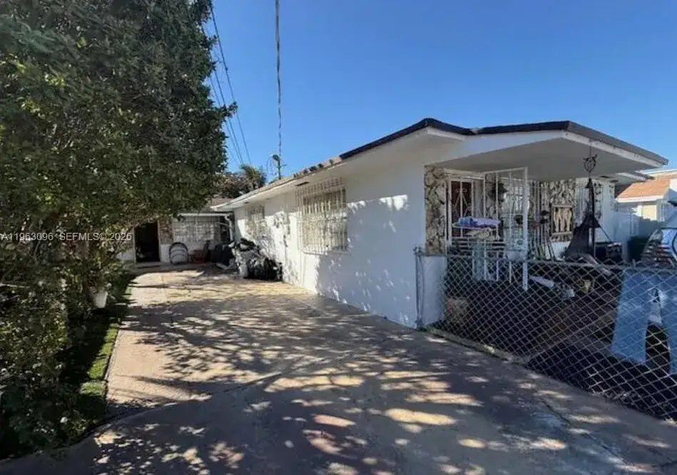 6 bedroom 4 bath Residential for sale at 3050 NW 26th St, Miami FL 33142