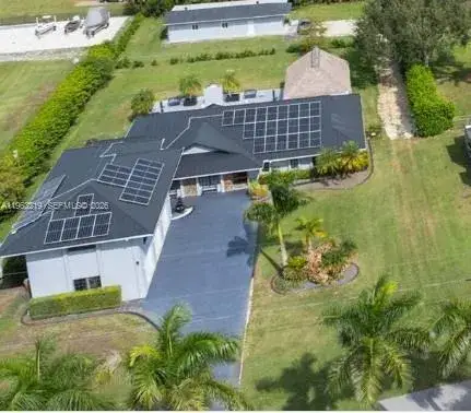 6 bedroom 5 bath Residential for sale at 14651 SW 16th St, Davie FL 33325