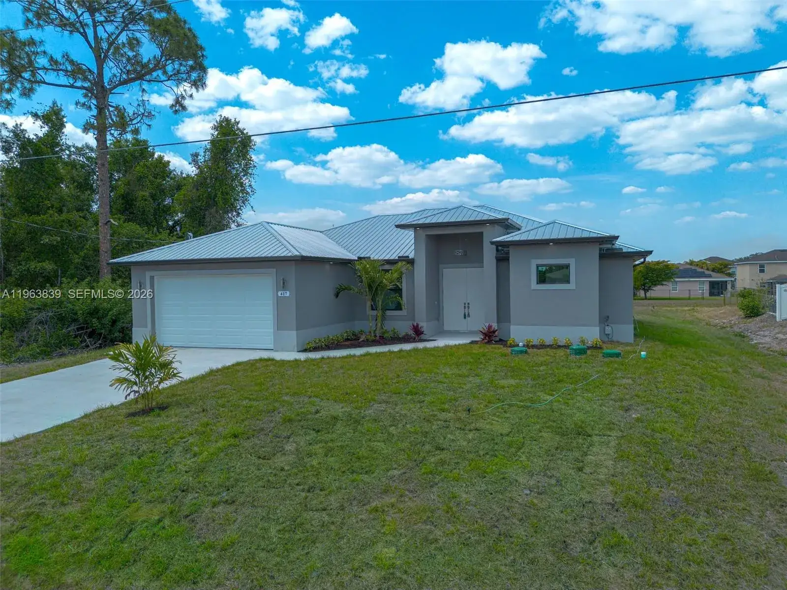 3 bedroom 2 bath Residential for sale at 417 Paddock St, Lehigh Acres FL 33974