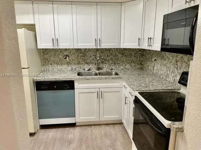 1 bedroom 1 bath Residential for sale at 1754 NW 55th Ave # 102, Lauderhill FL 33313