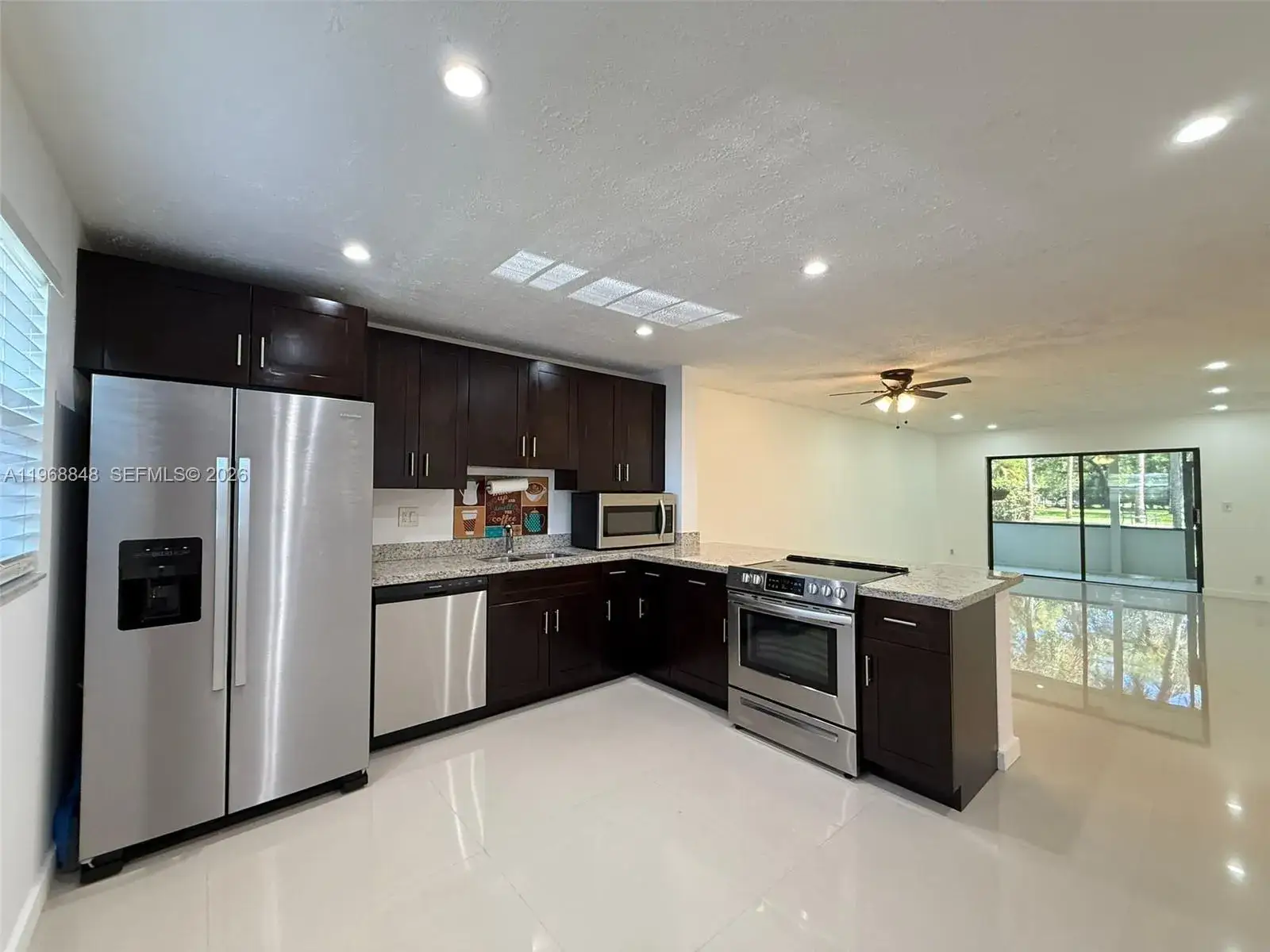 2 bedroom 2 bath Residential for sale at 6095 N Sabal Palm Blvd # 103, Tamarac FL 33319