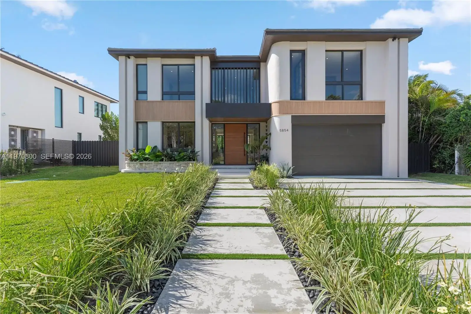 5 bedroom 6 bath Residential for sale at 5854 SW 30th St, Miami FL 33155