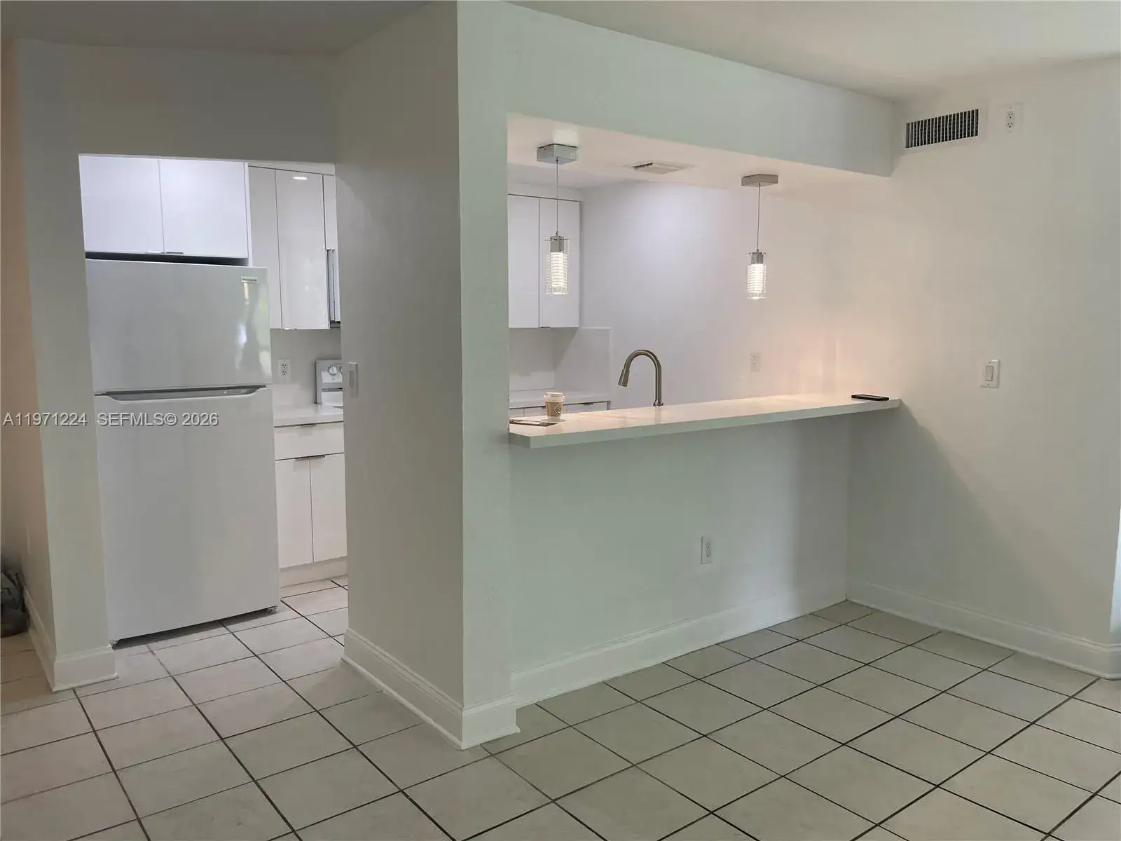 2 bedroom 2 bath Residential for sale at 7165 NW 186th St # A104, Hialeah FL 33015