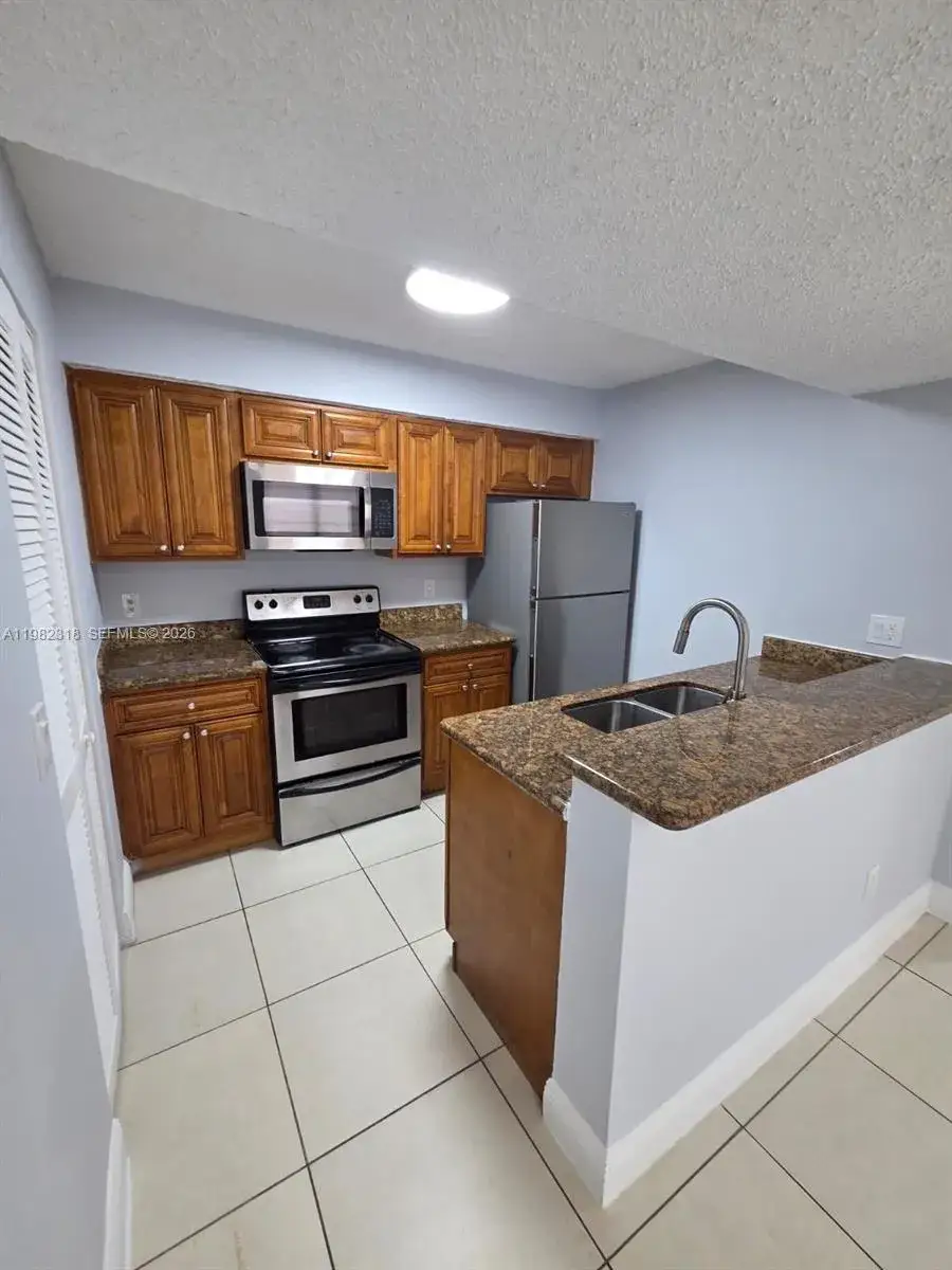 2 bedroom 2 bath Residential Lease for rent at 1241 SW 46th Ave # 1006, Pompano Beach FL 33069